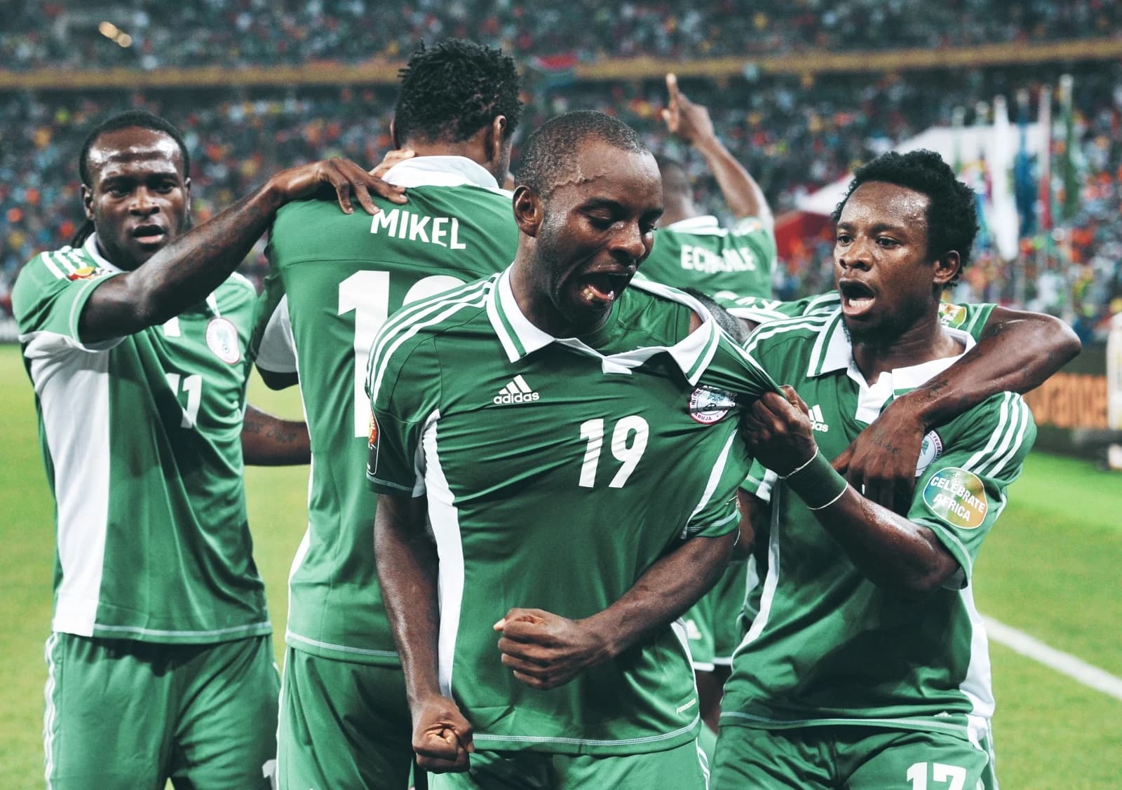 Nigeria football players celebrating during a match